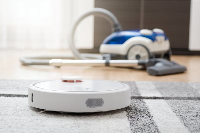 robot vacuum cleaner cleaning the room